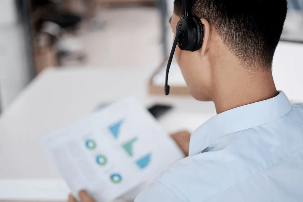 call center agent analyzing their performance metrics