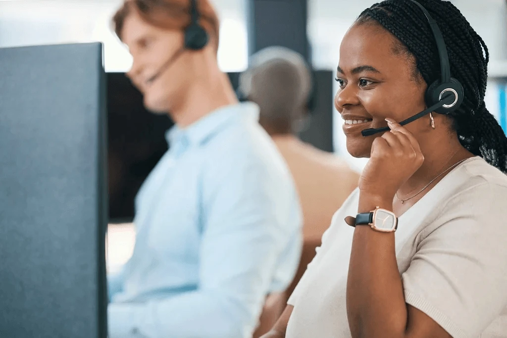 call center agent happily listening to a client