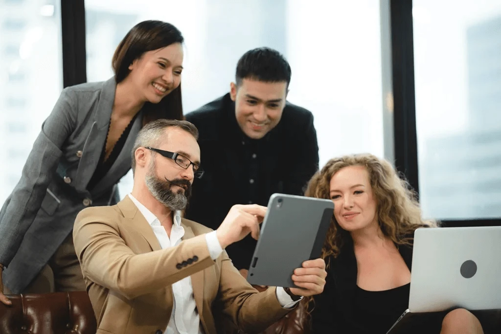 digital marketing team happy with the boost in their customer base