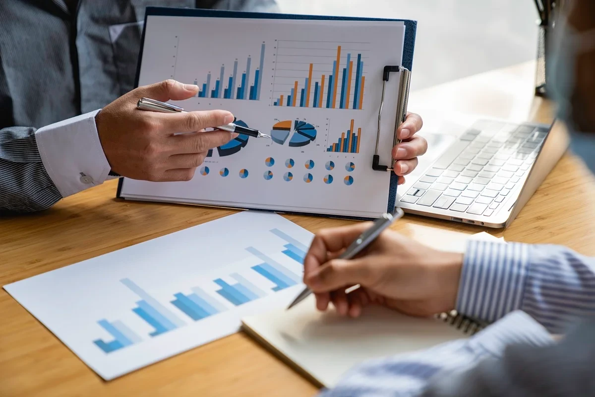 team of accountants performing financial analysis
