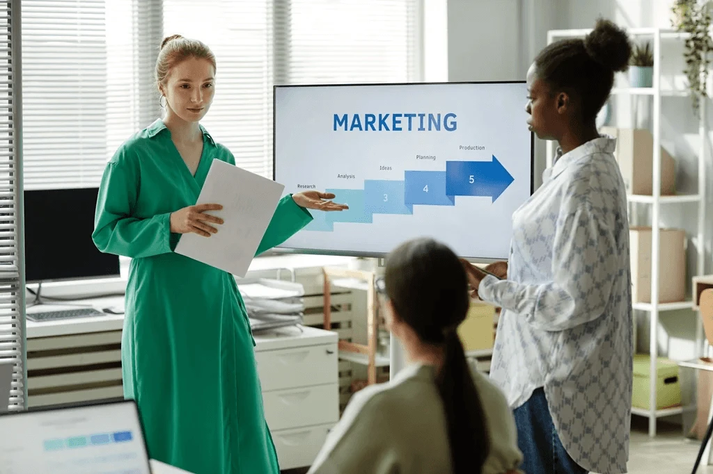 team of digital marketers discussing their strategies