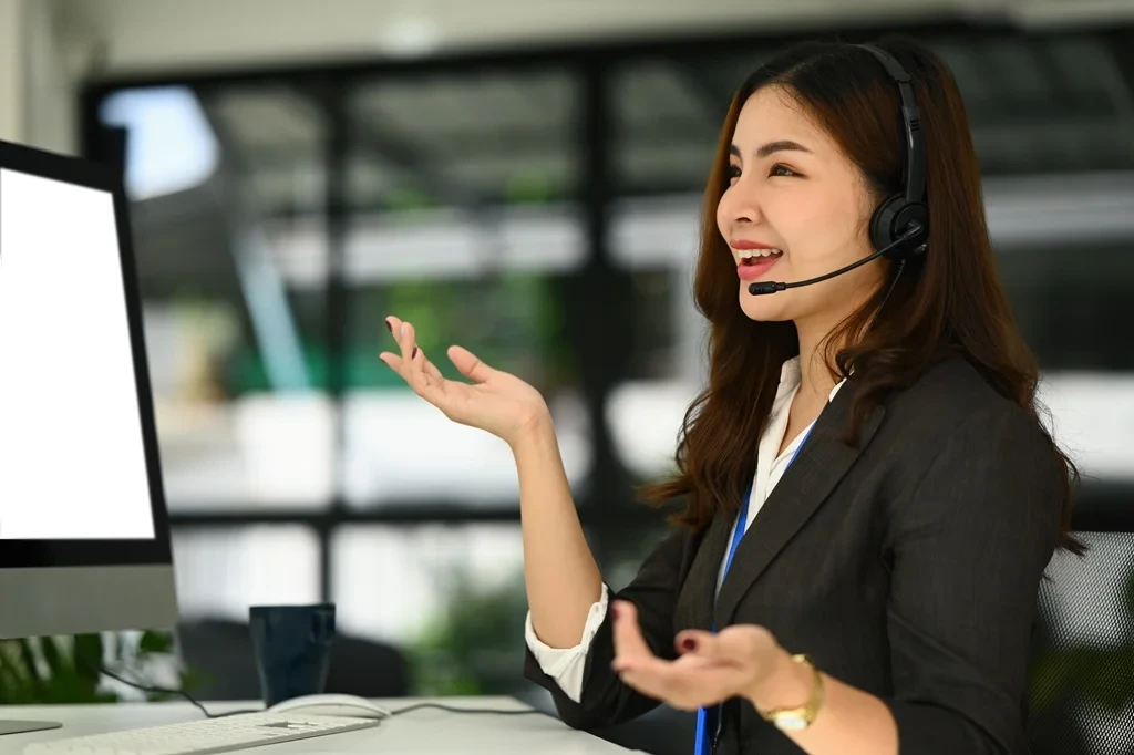 call center agent talking enthusiastically with a customer