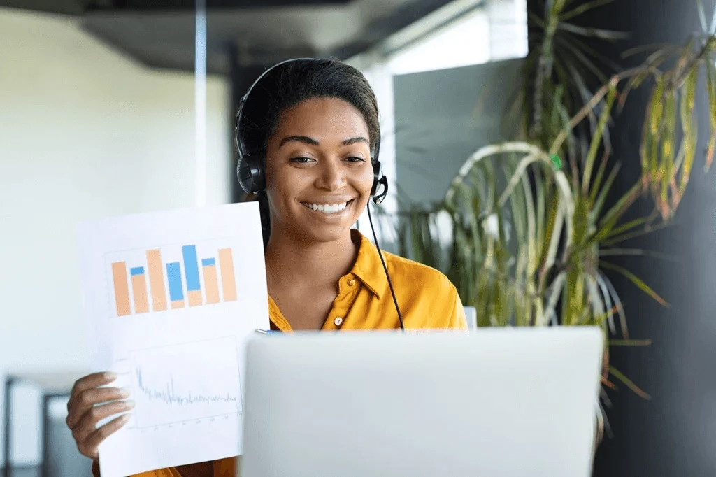 customer service agent discussing bar graphs about customer effort score