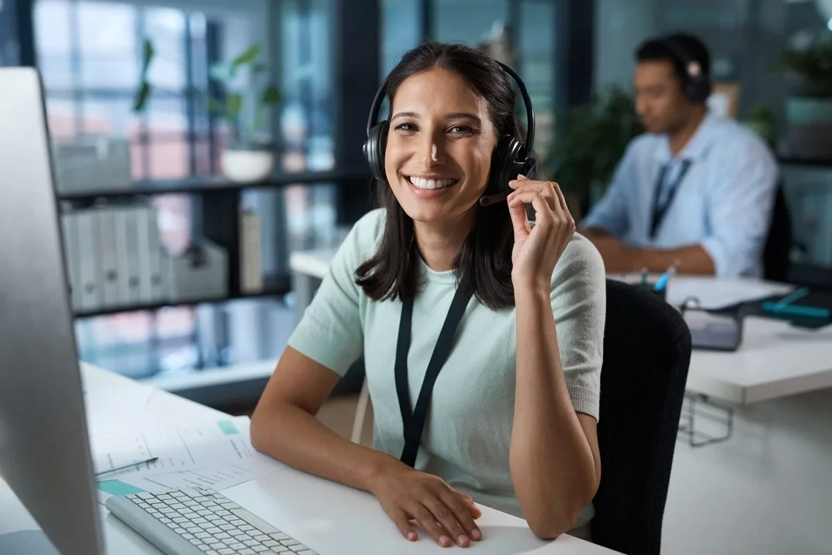 customer service agent wearing a headphone at work