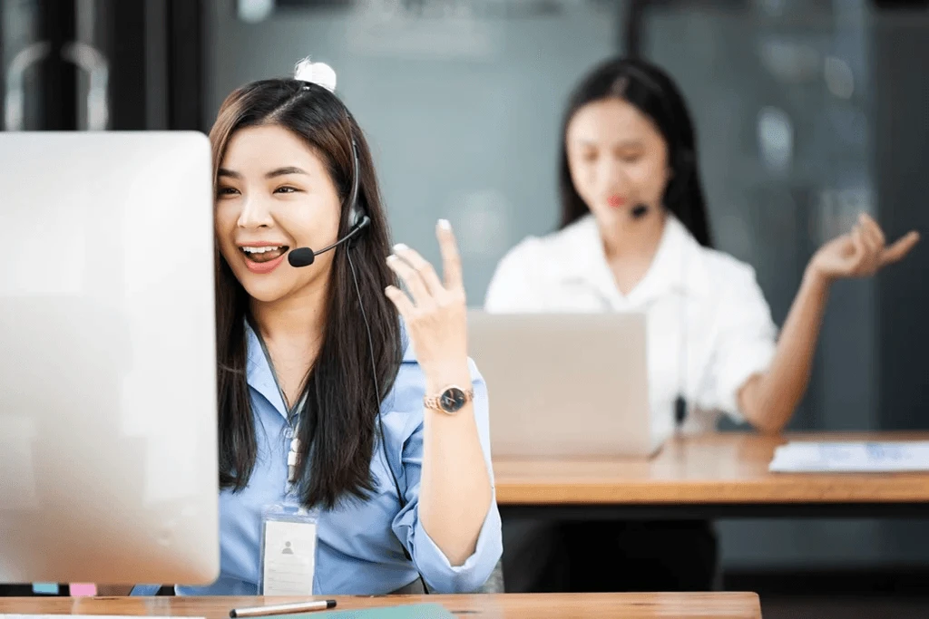 customer service representatives talking with clients with enthusiasm