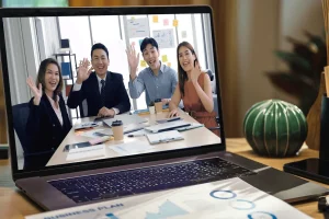 Filipino offshore team featured on the laptop screen