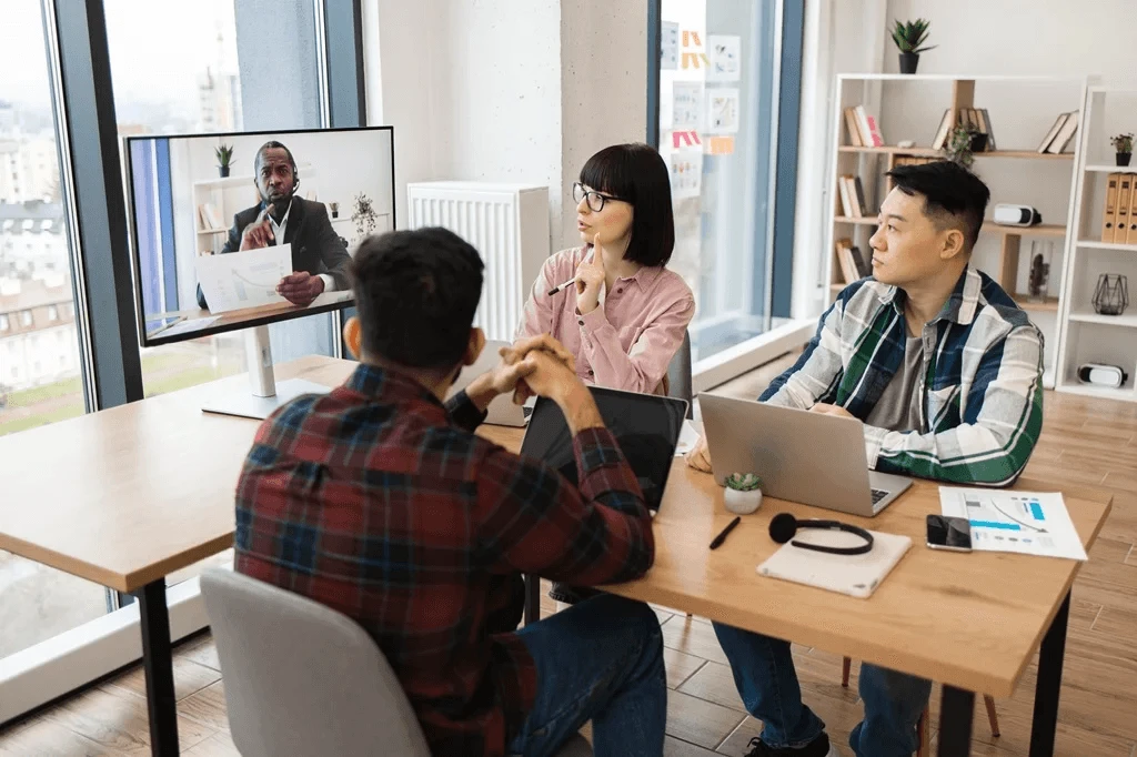 outsourced team discussing business matter with the CEO