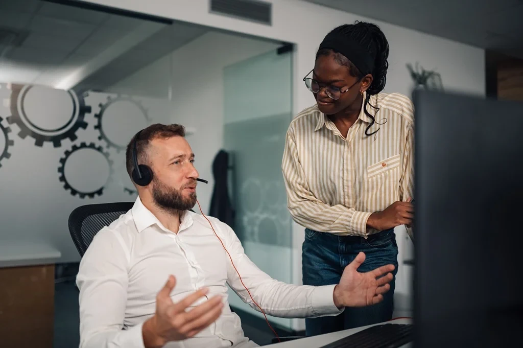 work-related interaction between two technical support employees