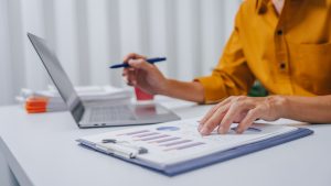 Young Serious asia people bookkeeper doing bookkeeping entrepreneur small business owner accountant