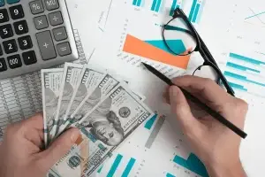accountant preparing reports about cash flow forecasting