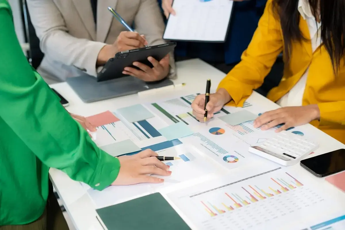 accountants compiling financial documents for audit preparation