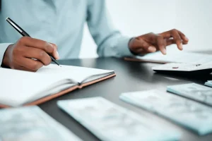 busy accountant representing the outsourcing bookkeeping benefits