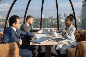 company representatives discussing legal process outsourcing