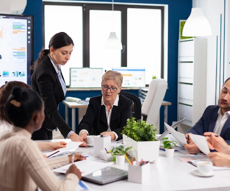 group of businesspeople discussing work