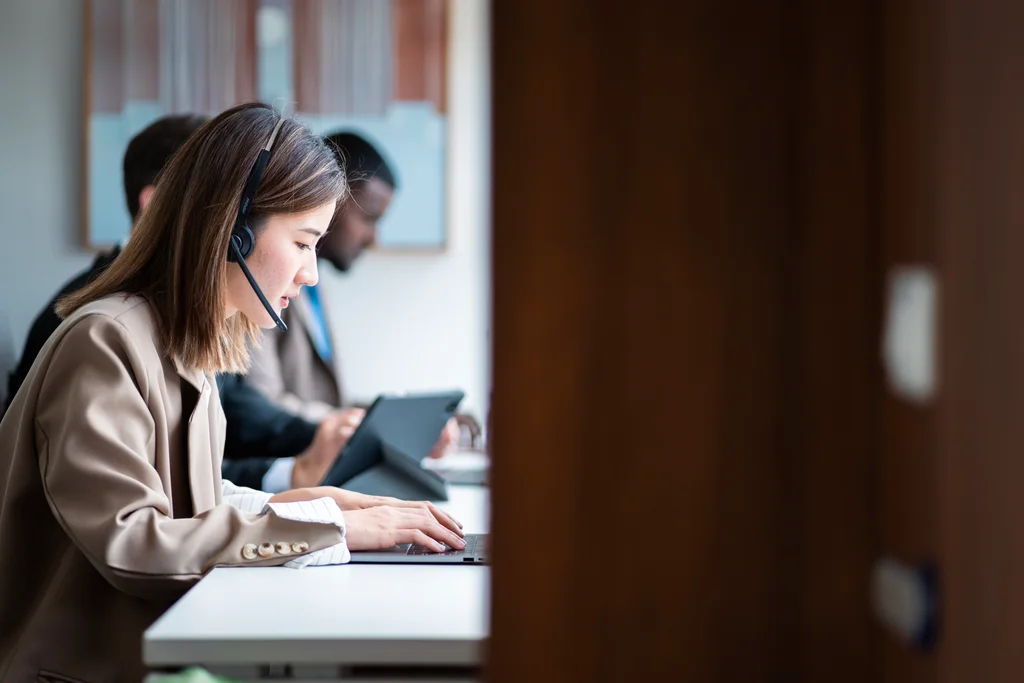 asian call center representative accepting international calls