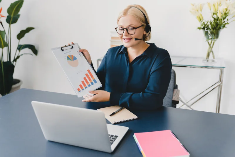 businesswoman presenting sales charts during an online meeting about trends of ecommerce