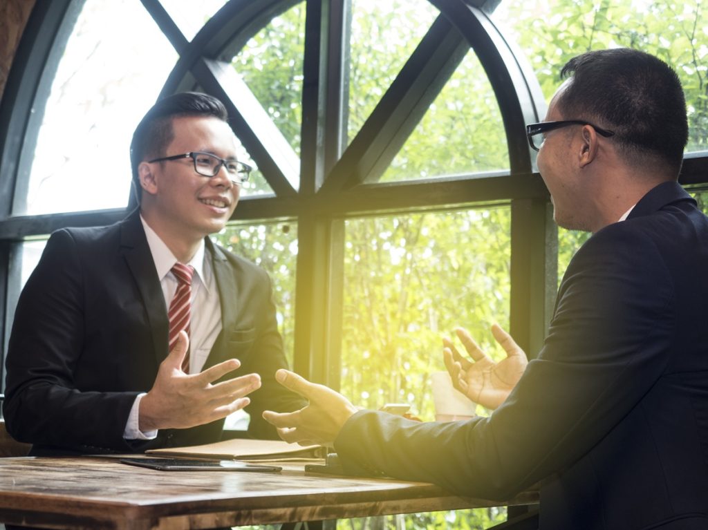 client happy sharing feedback with professional