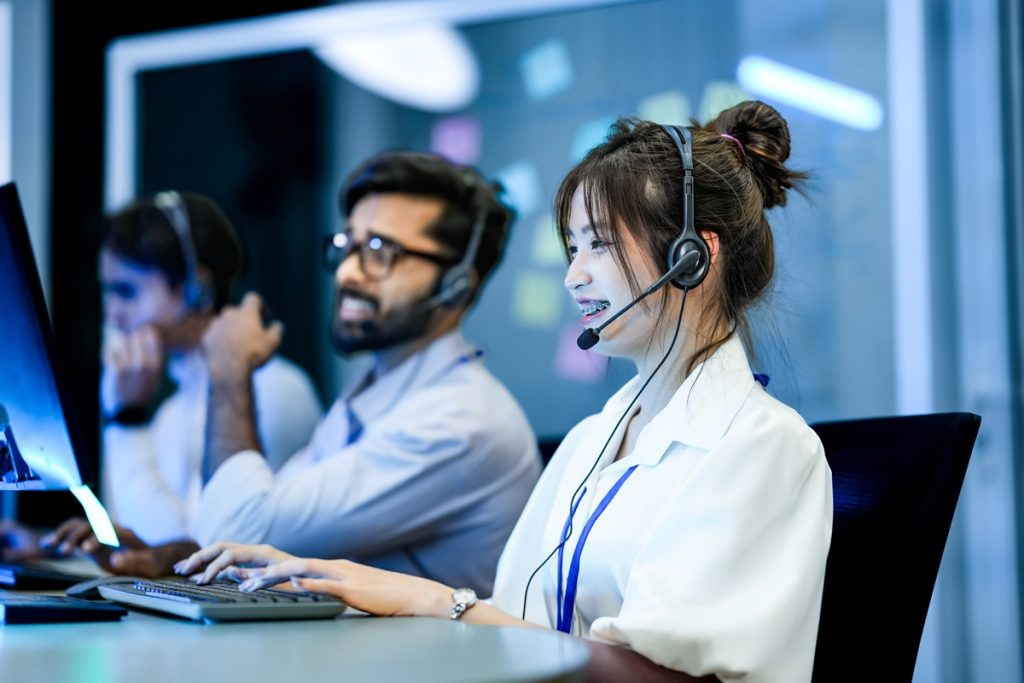 diverse BPO team working together