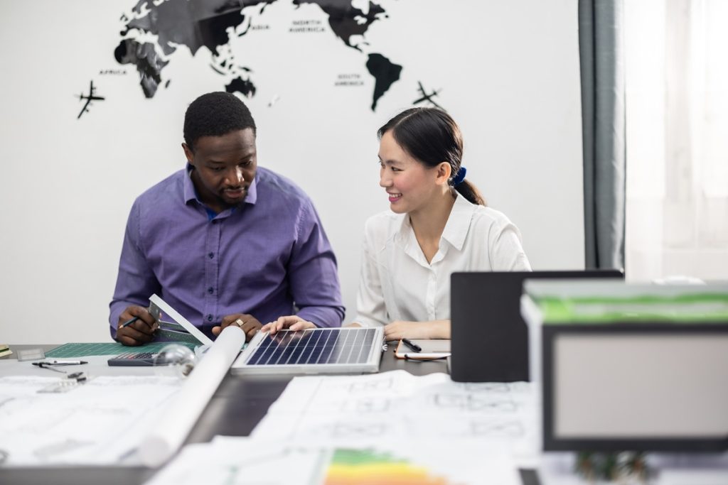 two professional talking about milestone