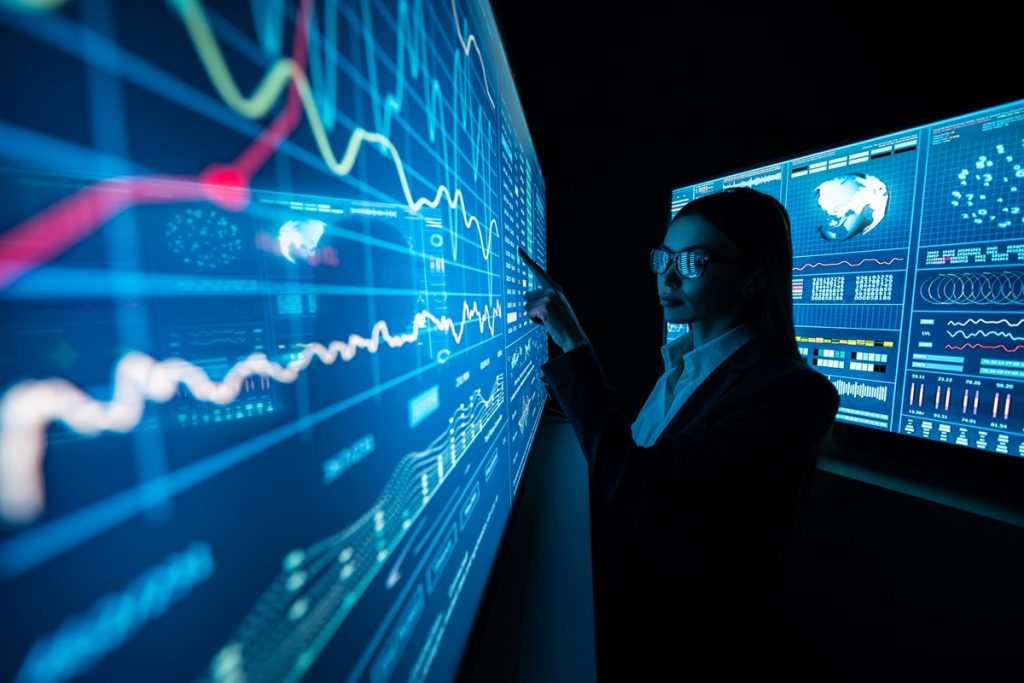 woman data analyst reviewing report