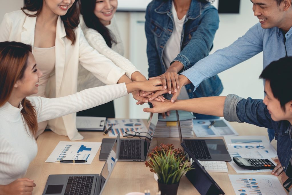 filipino working in global capability centers in the philippines celebrate team work