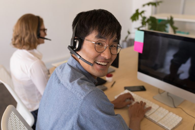 man happy working know skills of a customer service representative