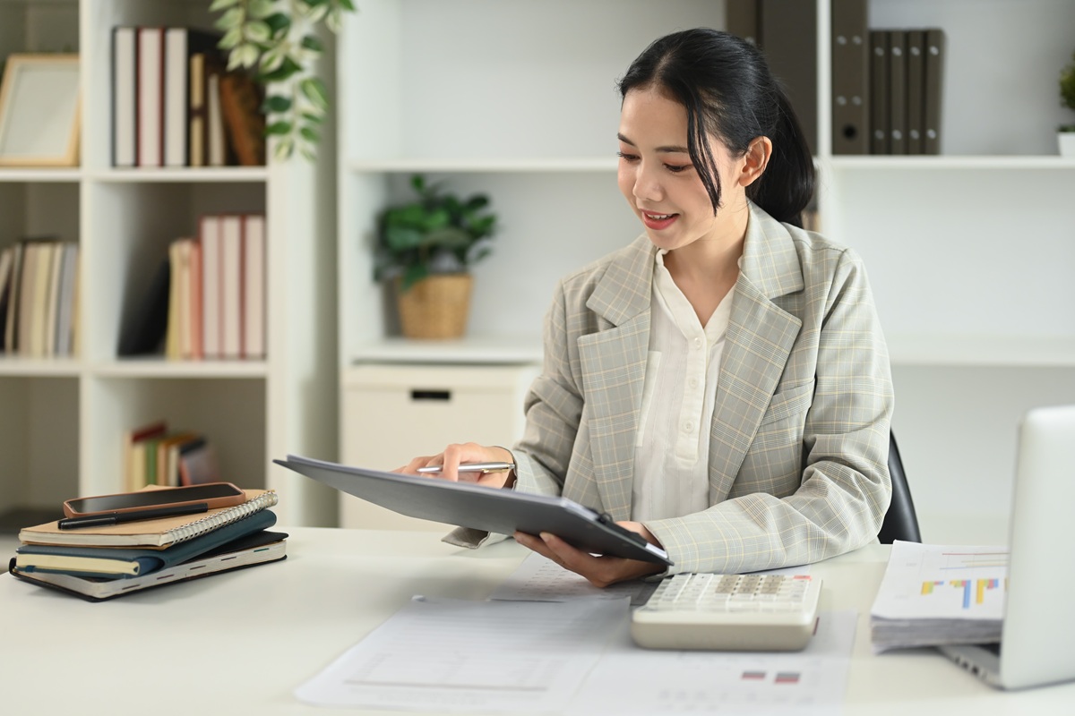 outsourced bookkeeper preparing financial report