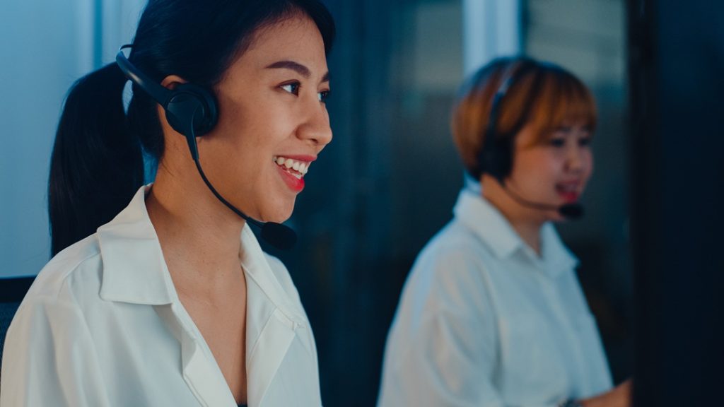 two professional with stress management customer service skills working efficiently