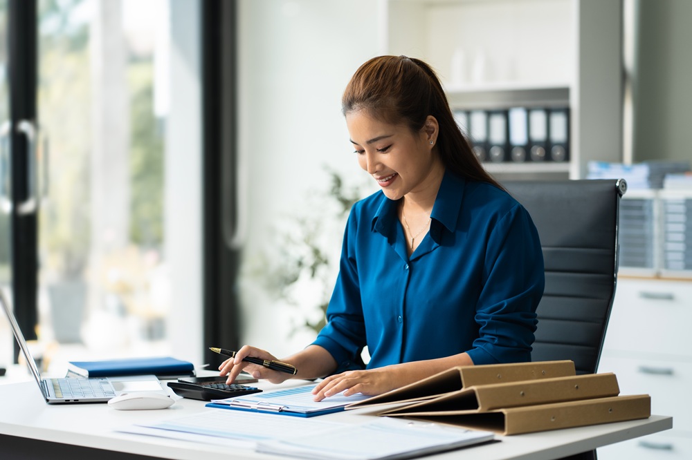 A professional reviewing financial report