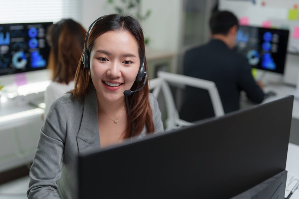 woman working and understand bpo vs call center agent difference