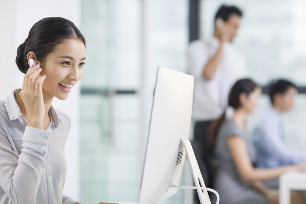 A call center agent taking phone calls