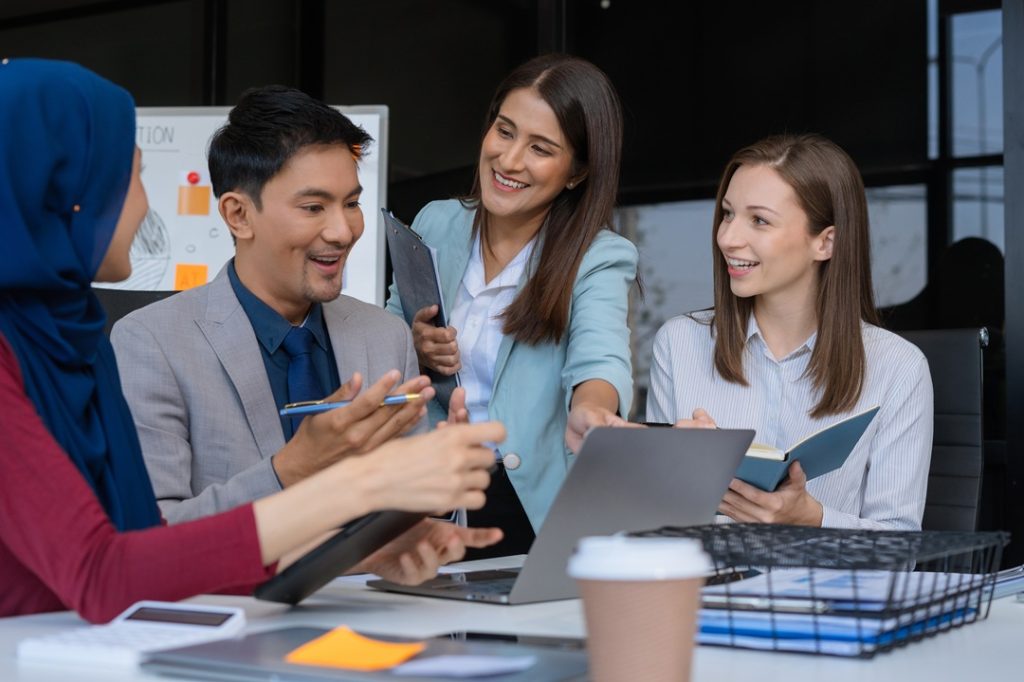 happy outsource team communicating