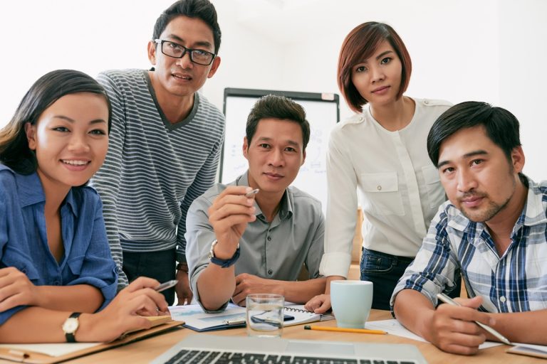 seo outsourcing company team reviewing client in a meeting