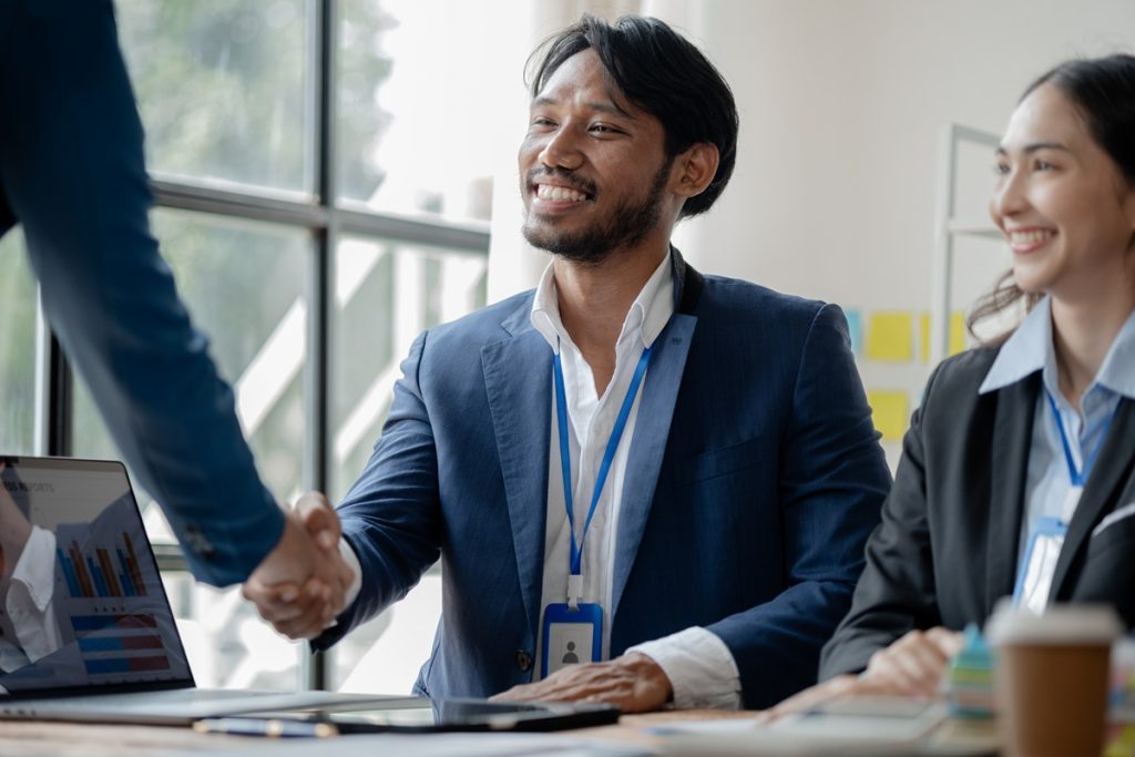 recruitment process outsourcing services provider smiling