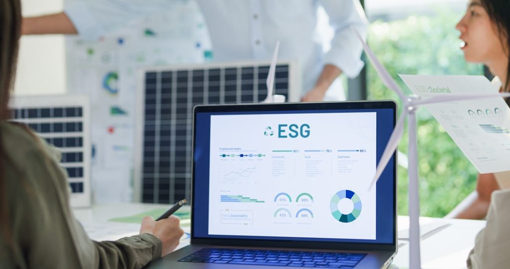 Business people reviewing ESG integration in outsourcing as an important business matter